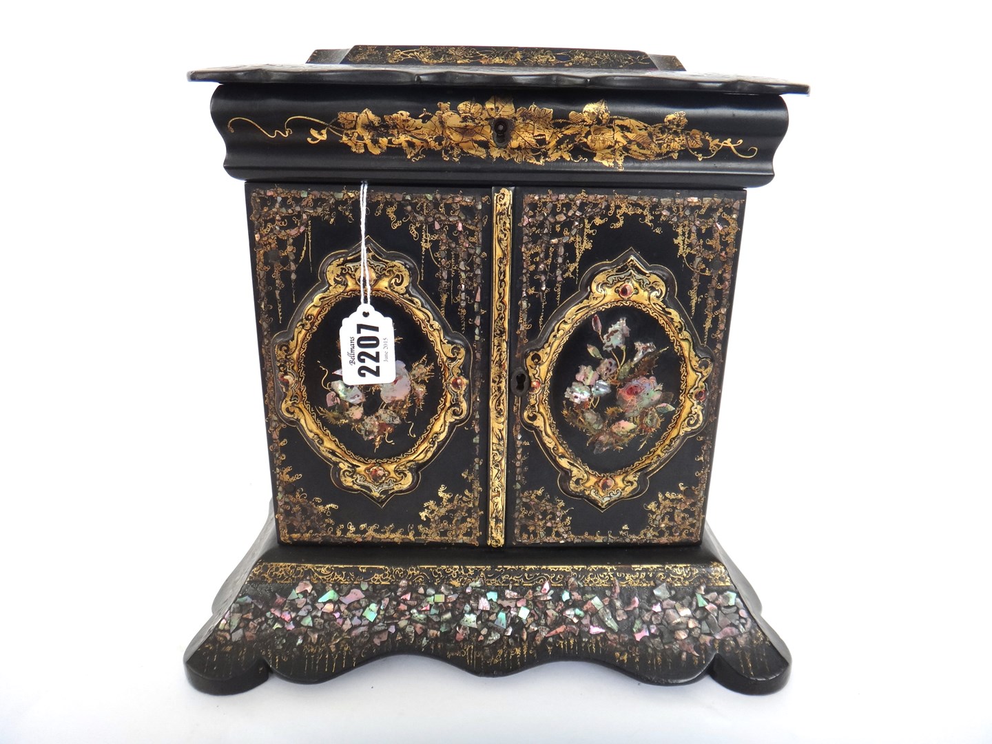 Appraisal: A Victorian papier mache and mother of pearl inlaid table