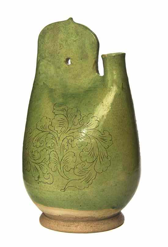 Appraisal: A Green Glazed Pottery Flask Liao Dynasty in the form