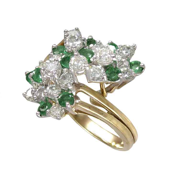 Appraisal: EMERALD AND DIAMOND RING K yellow gold ring contains round