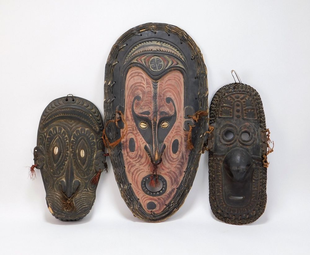 Appraisal: PC Sepik River New Guinea Carved Wood Masks New Guinea