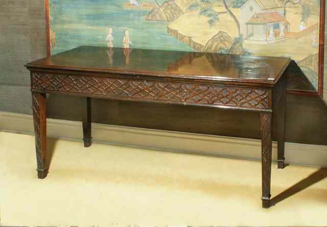 Appraisal: A GEORGE III RECTANGULAR MAHOGANY CENTRE TABLE the top with