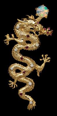 Appraisal: Gold dragon pendant kt yellow gold set with cabochon opal