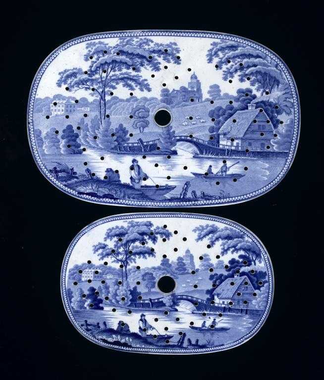 Appraisal: TWO BLUE PRINTED EARTHENWARE WILD ROSE PATTERN DRAINERS and cm