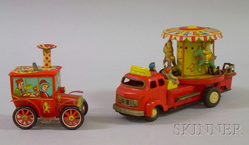 Appraisal: Lithographed Tin Battery-op Merrygoround Circus Truck and a Japanese Lithographed