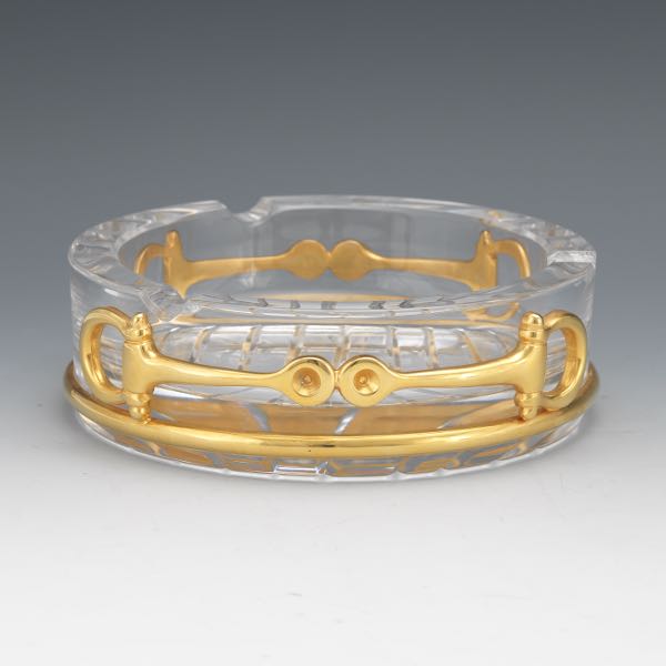 Appraisal: CRYSTAL GUCCI ASHTRAY x Clear Gucci ashtray with gilt metal