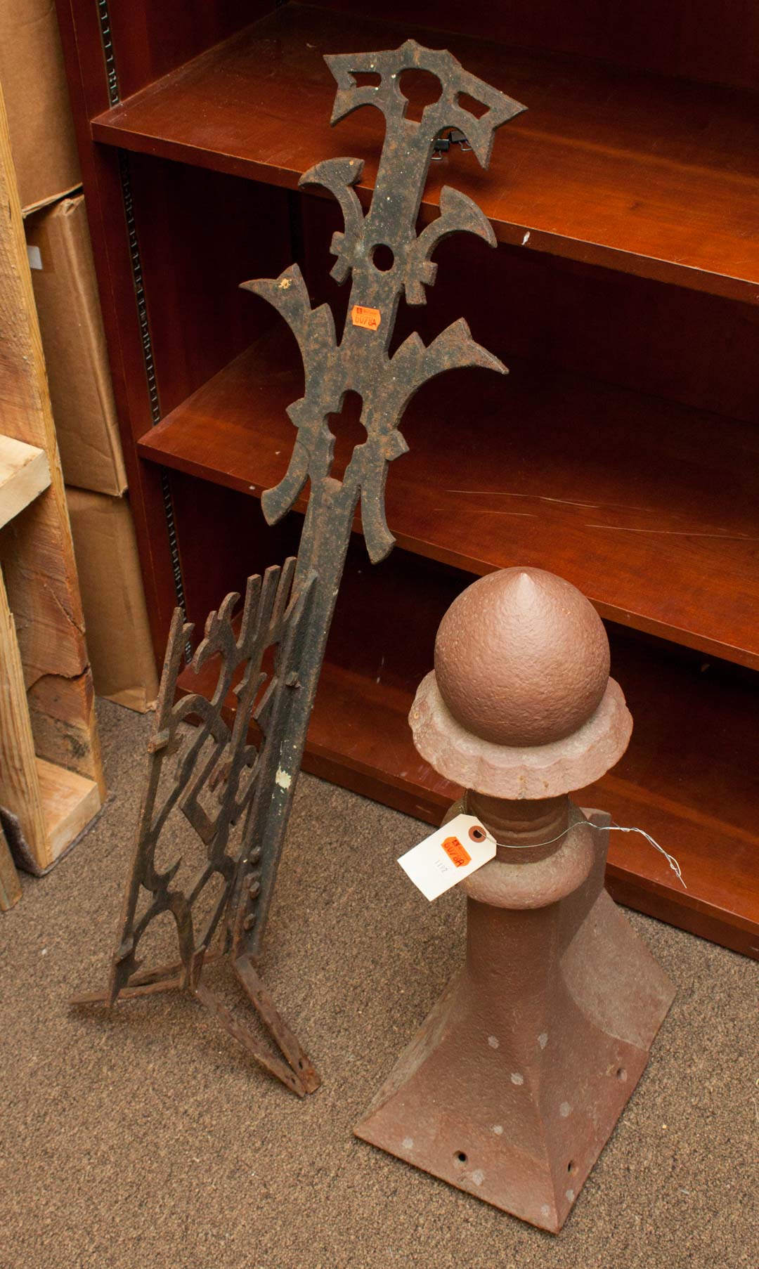 Appraisal: a Two iron roof finials