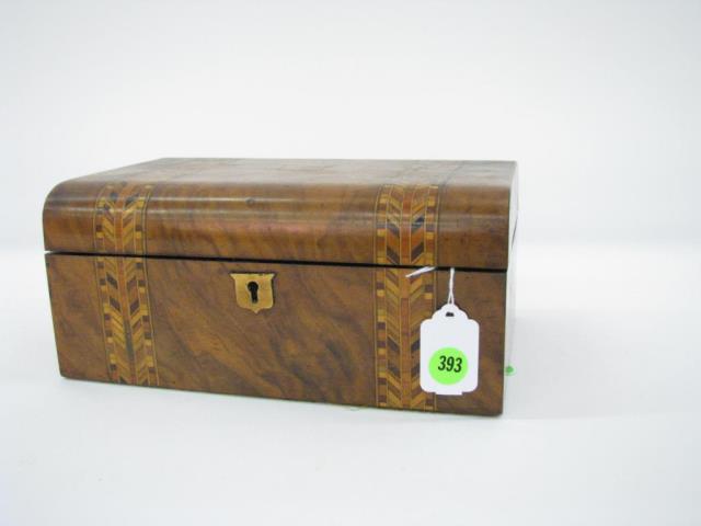 Appraisal: An antique sewing box with crossbanded inlaid veneers purple fabric