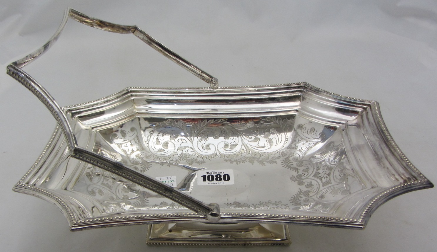 Appraisal: Plated wares comprising a bread or cake basket with scroll