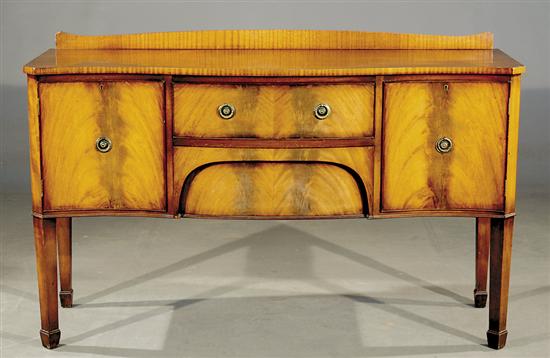 Appraisal: George III style mahogany serpentine sideboard first half th century