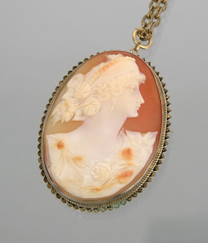 Appraisal: A Carved Shell Cameo in Silver Frame with Chain A