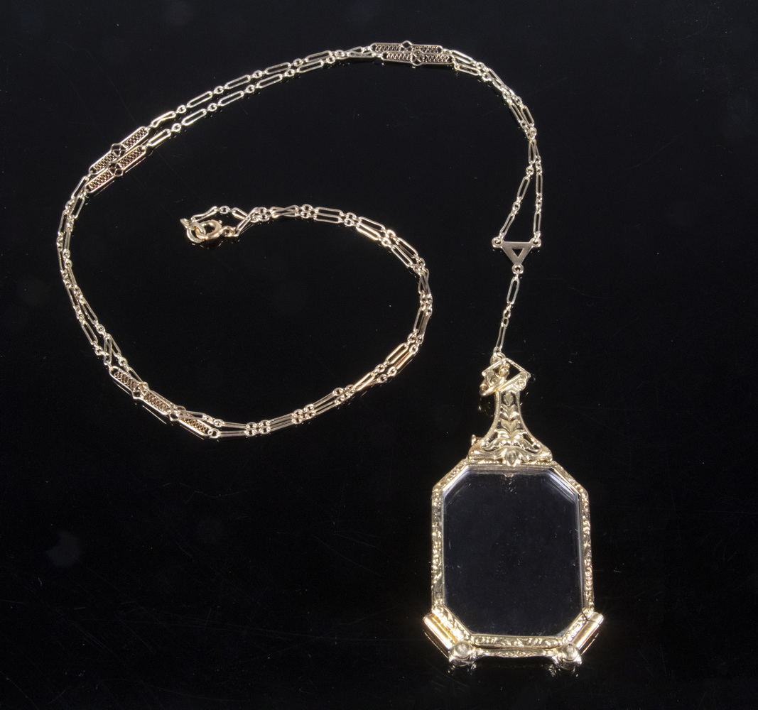 Appraisal: EDWARDIAN K GOLD LORGNETTE WITH CHAIN Beautifully engraved chain overall