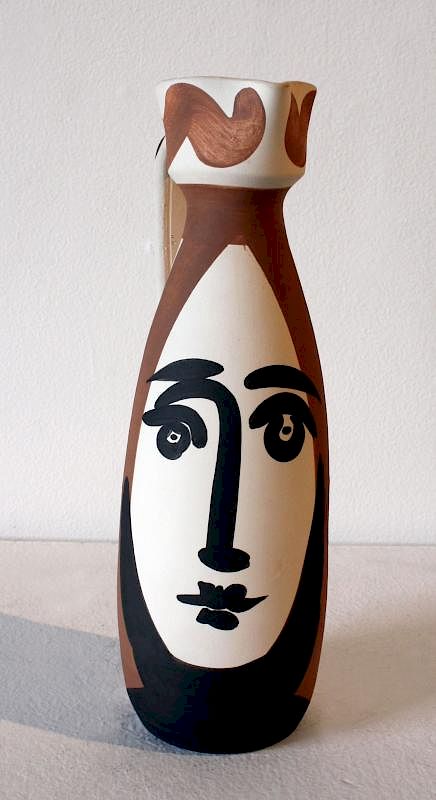 Appraisal: Pablo PicassoFace Pablo Picasso Face Partially glazed earthenware pitcher Edition