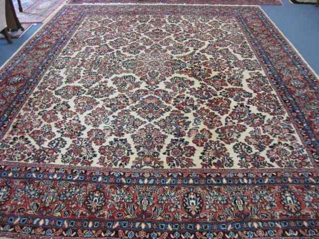 Appraisal: Sarouk Persian Handmade Room Size Rug fine floral bouquets on