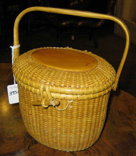 Appraisal: JOSE REYES NANTUCKET LIGHTSHIP BASKET Finely woven with matching hinged