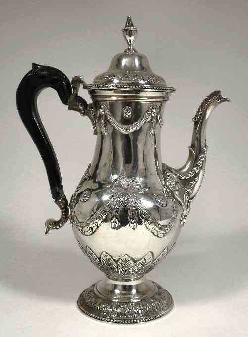 Appraisal: A George III silver coffee pot the baluster shaped body