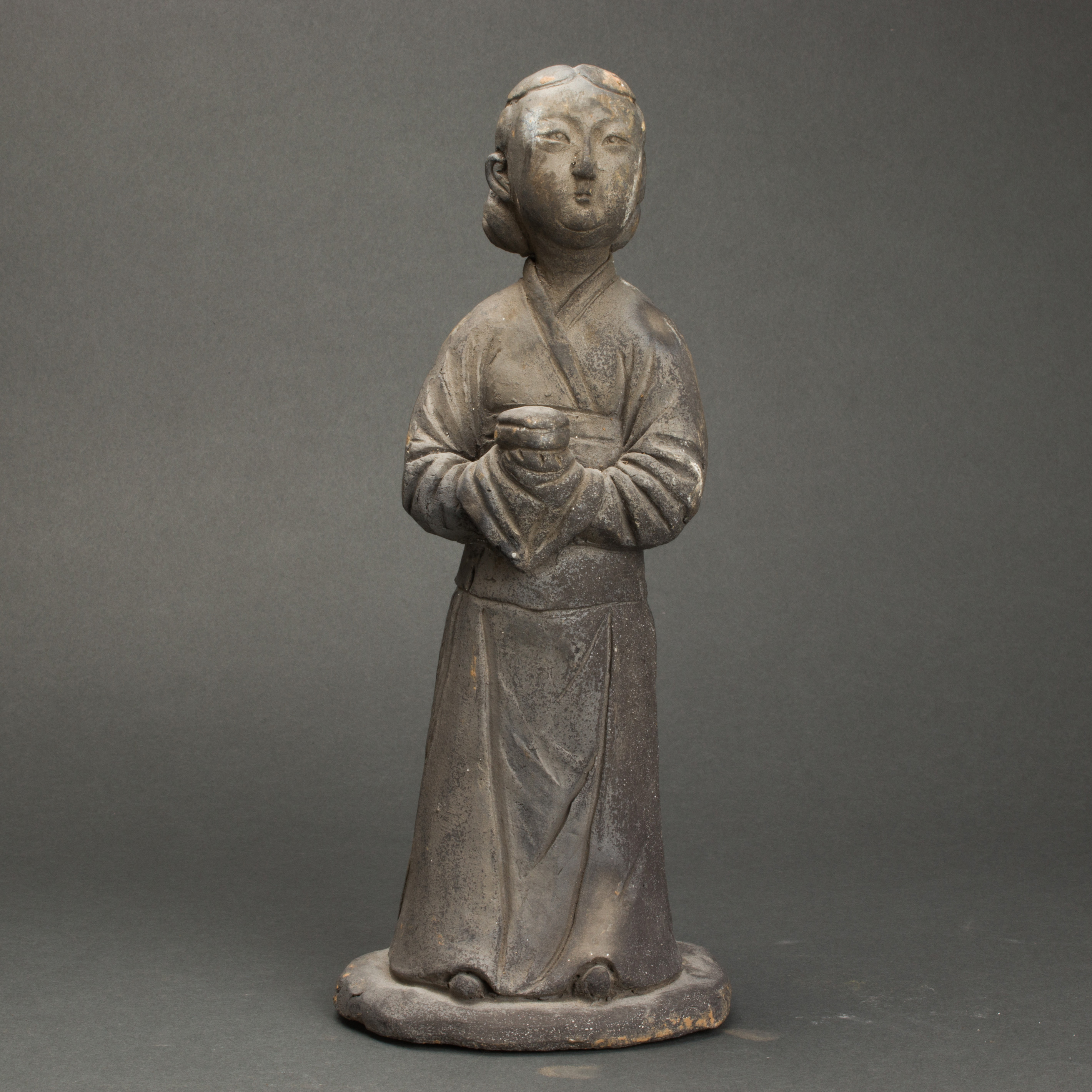 Appraisal: CHINESE YUAN DYNASTY POTTERY FIGURE Chinese Yuan dynasty pottery figure