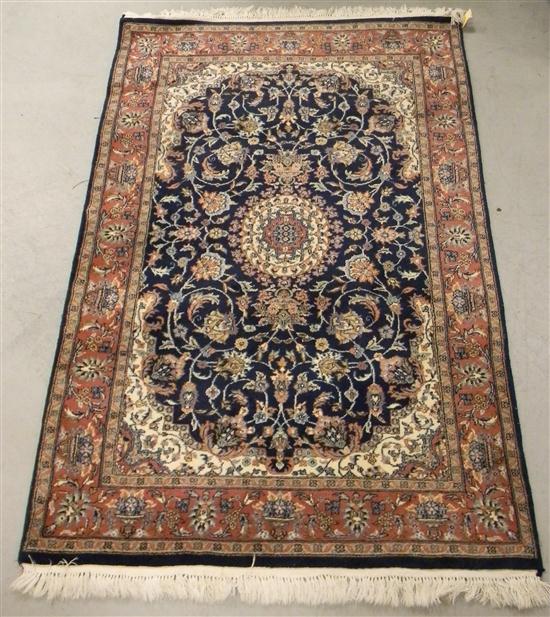 Appraisal: Rug blue field center medallion handknotted ' l x '