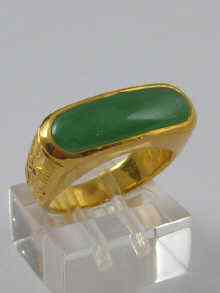 Appraisal: A jade and yellow metal tests high carat gold ring