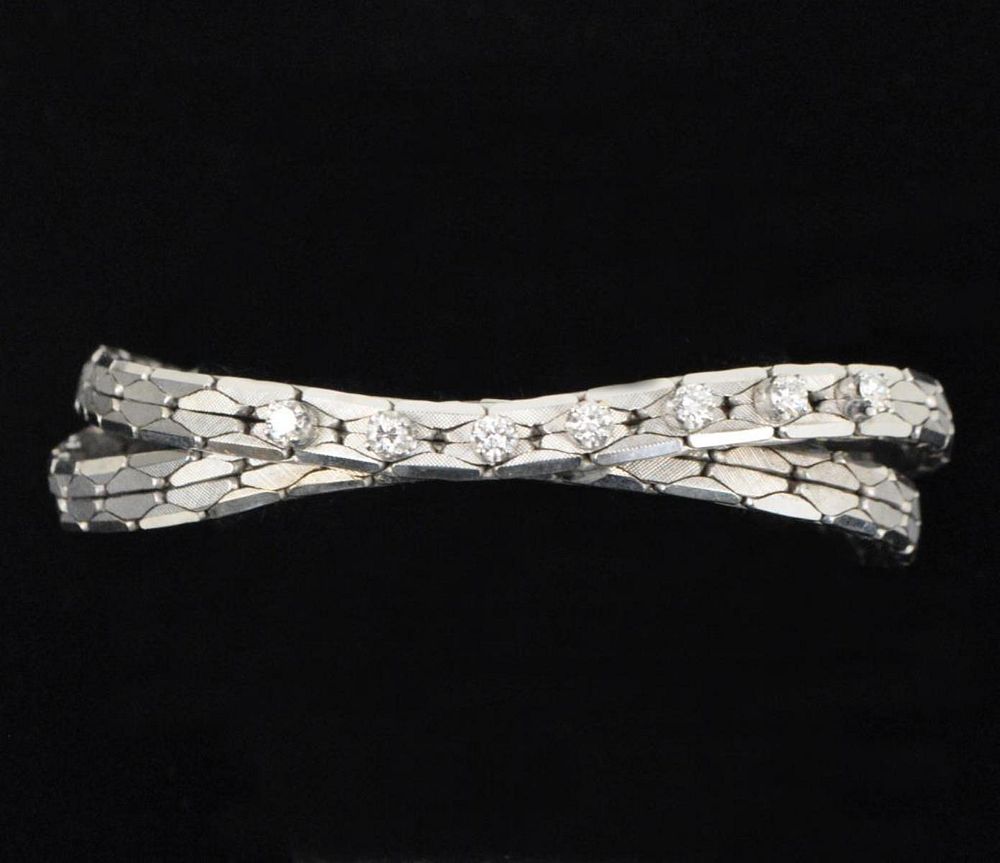 Appraisal: K Gold Diamond Bracelet in braided chain design band mounted