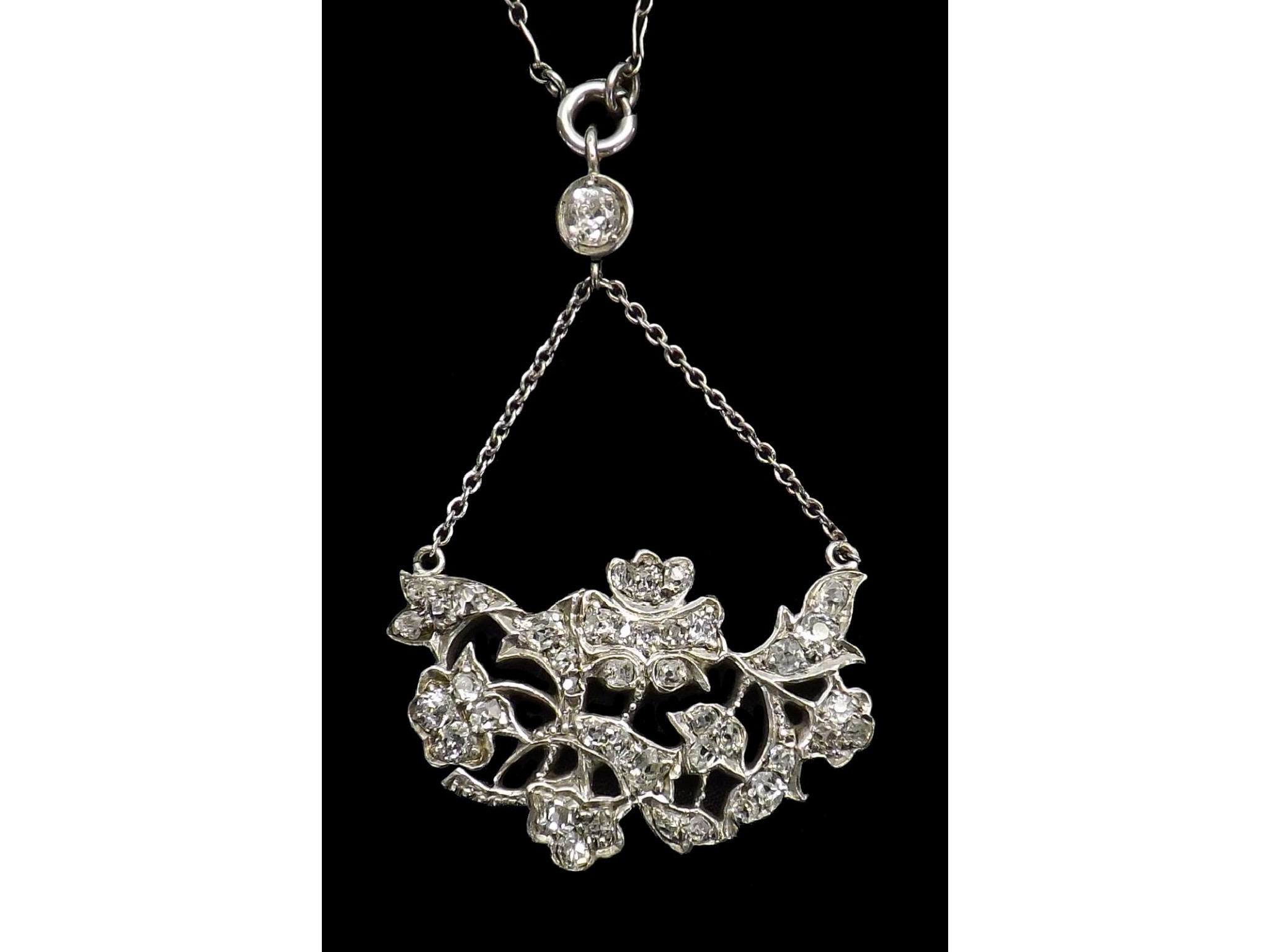 Appraisal: Attractive diamond set floral pendant with old-cut diamonds in a