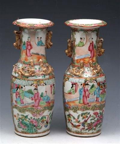 Appraisal: A PAIR OF CHINESE CANTON VASES with fo dog handles