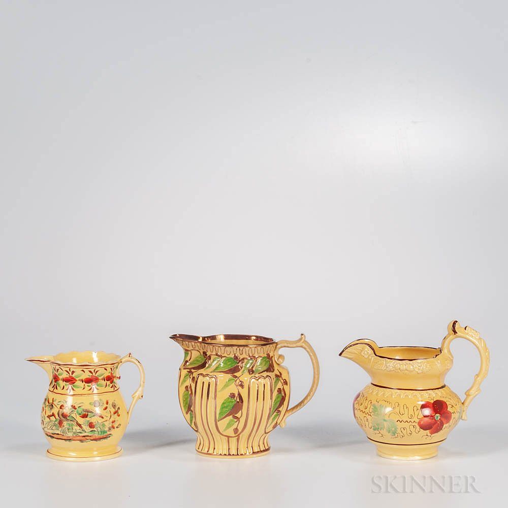 Appraisal: Three Yellow-glazed Staffordshire Jugs Three Yellow-glazed Staffordshire Jugs England early