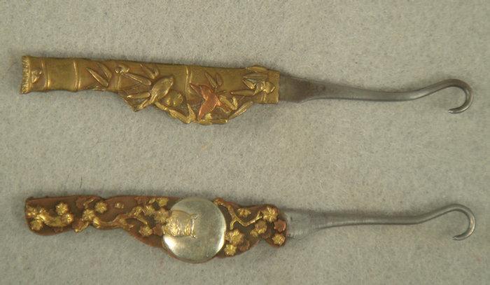 Appraisal: Japanese mixed metal folding button hooks owls the other with