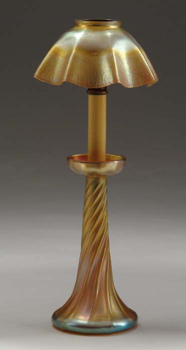 Appraisal: TIFFANY STUDIOS CANDLE LAMP Lovely gold Favrile candle lamp has