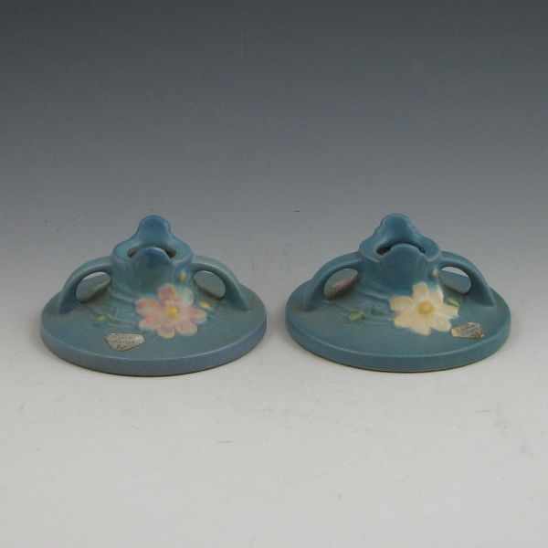 Appraisal: Pair of Roseville Cosmos candleholders in blue with original foil