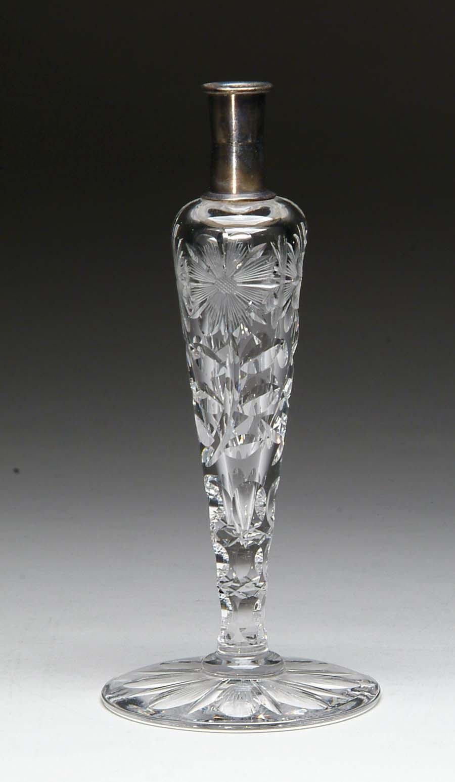 Appraisal: CUT GLASS LAMP BASE Cut in floral and leaf pattern