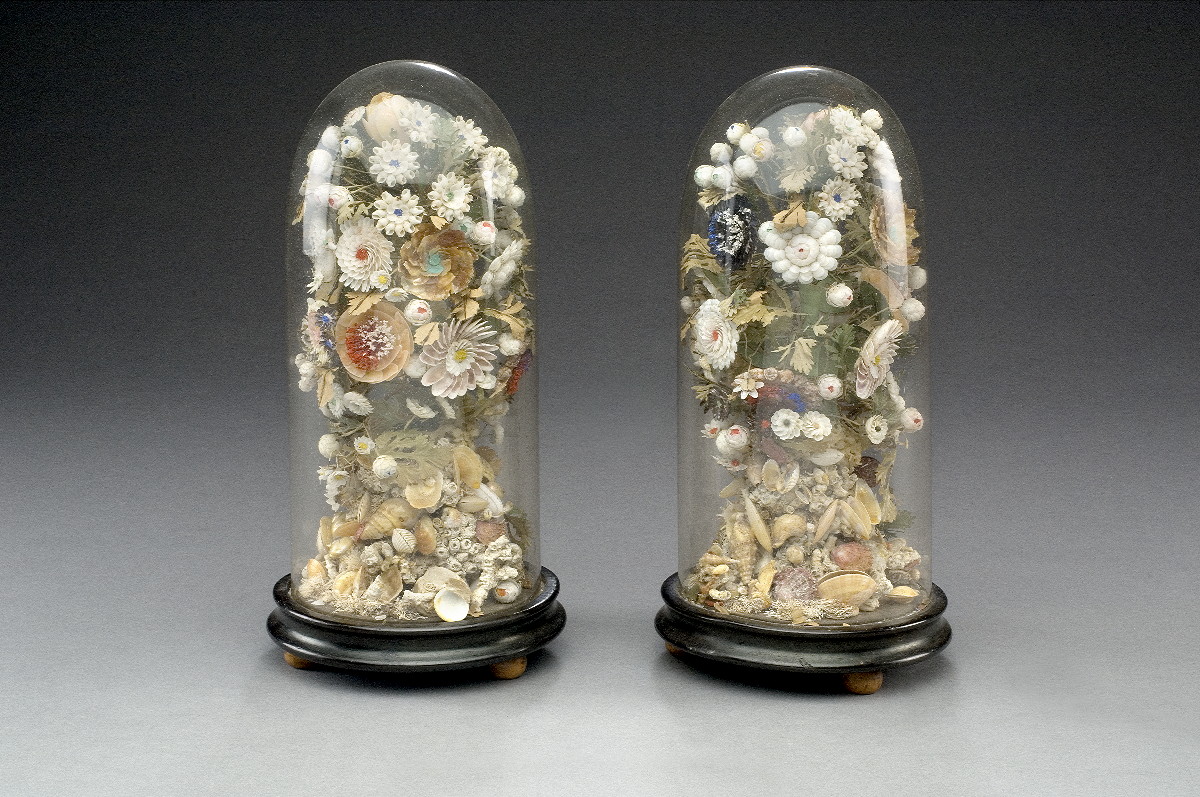 Appraisal: PAIR OF AMERICAN SHELLWORK FLORAL ARRANGEMENTS ENCASED IN GLASS DUST