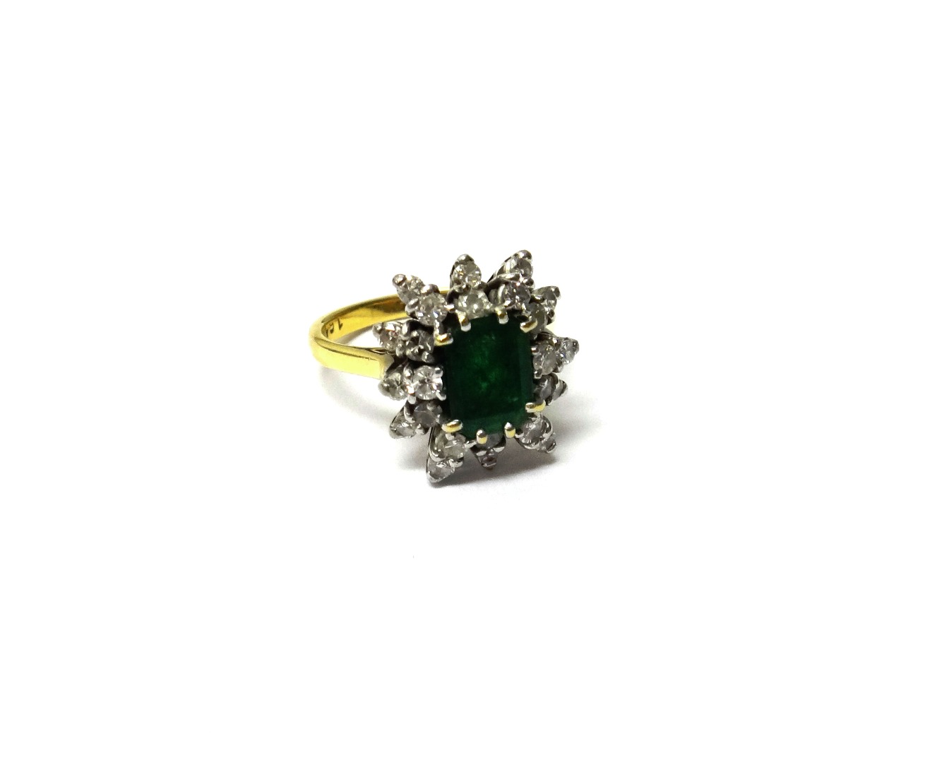 Appraisal: An ct gold emerald and diamond set cluster ring claw