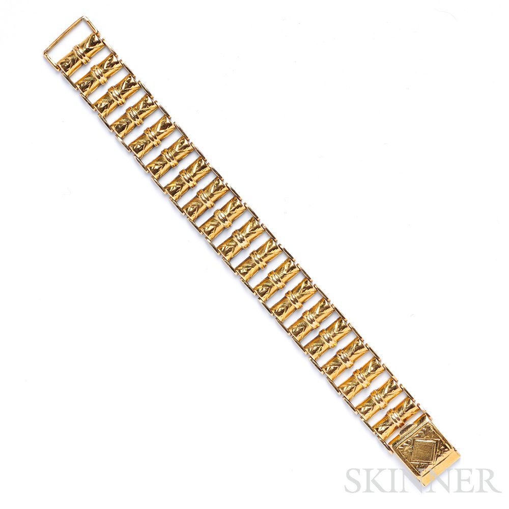 Appraisal: kt Gold Bracelet of engraved cylindrical links dwt lg in