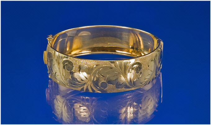 Appraisal: ct Gold Hinged Bangle With Floral Etched Decoration Fully Hallmarked