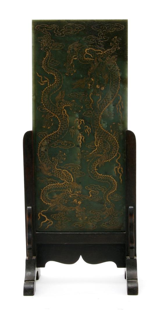 Appraisal: A Chinese Spinach Jade Rectangular Plaque incised and gilt with