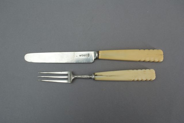 Appraisal: A child's knife and fork in sterling silver with ivory