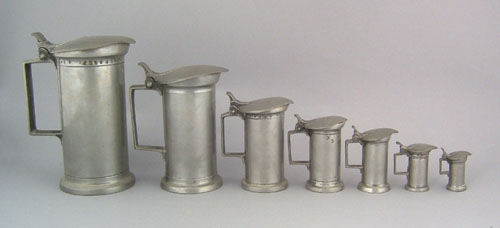 Appraisal: Seven French pewter graduated lidded measures ca with numerous touchmarks