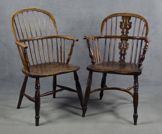 Appraisal: Associated Pair of English Windsor ChairsOf typical form Yew wood