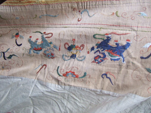 Appraisal: A Chinese embroidered cloth probably an altar cloth worked with