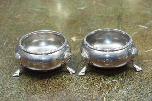 Appraisal: A PAIR OF VICTORIAN SILVER SALTS OF BUN FORM marks