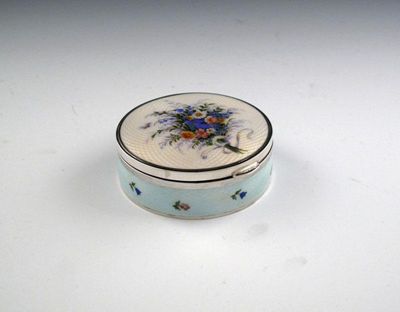 Appraisal: A German silver and enamel dressing table box circular form