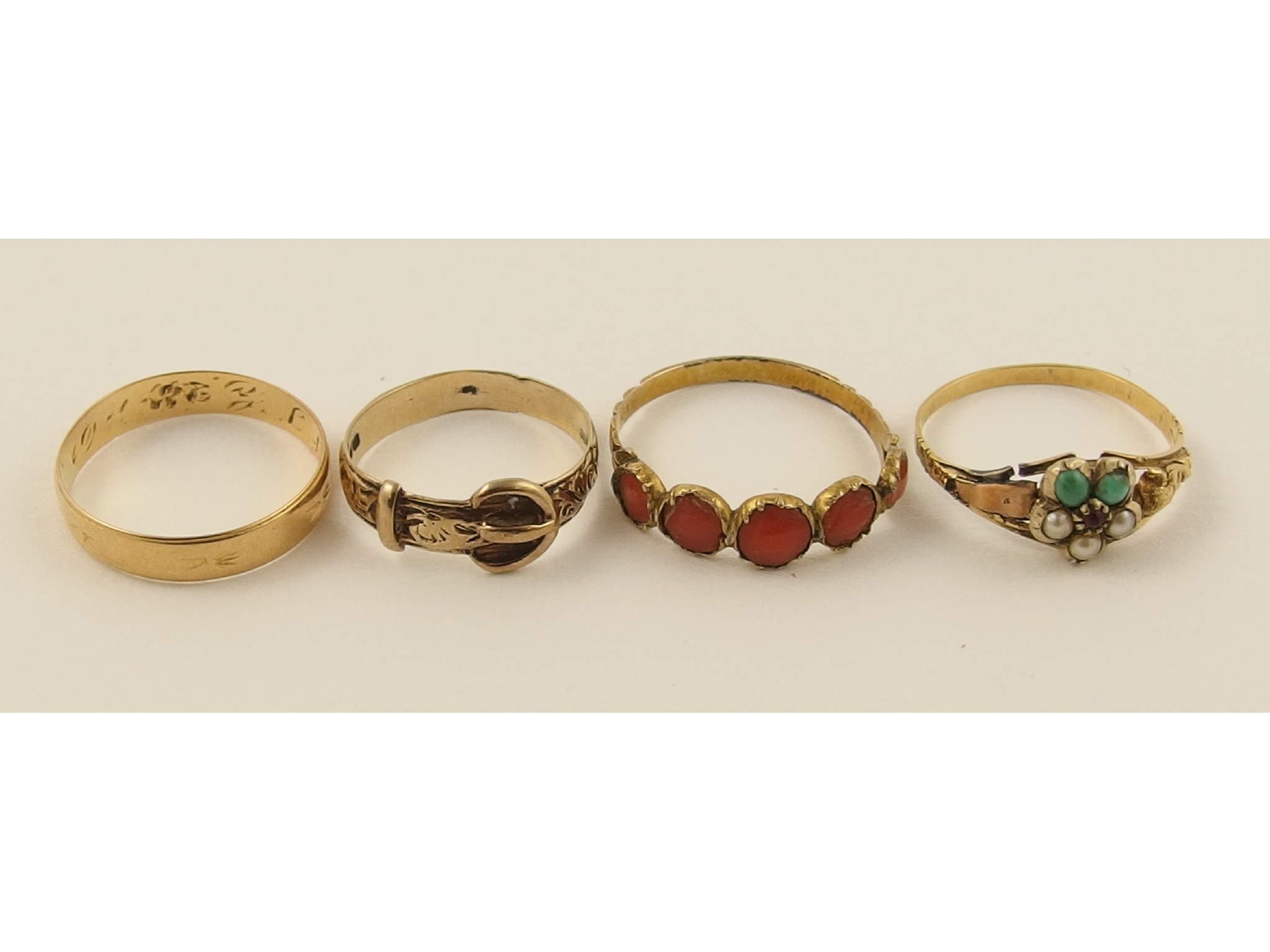 Appraisal: Four yellow metal rings two gem set