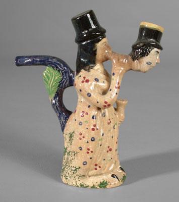 Appraisal: Unusual ceramic pipe standing woman smoking pipe bowl of which