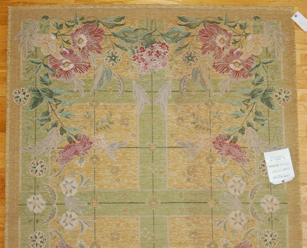 Appraisal: FLORAL FABRIC RUG considered a wall hanging consisting of a