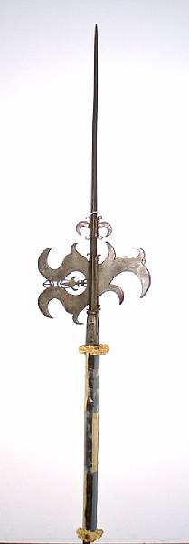 Appraisal: An elaborate Victorian halberd head Comprising a inch spike of