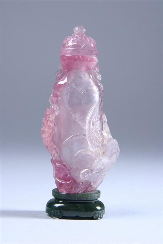 Appraisal: CHINESE CARVED TOURMALINE VASE AND COVER Flattened ovoid form with