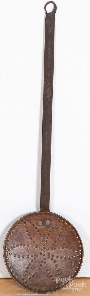 Appraisal: Wrought iron and copper straining ladle th c Wrought iron