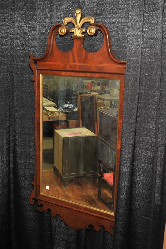 Appraisal: MIRROR American th cenutry Chippendale style mirror with scroll pendiment