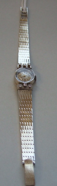 Appraisal: A ladies diamond set Starina bracelet watch the circular silvered