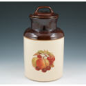 Appraisal: McCoy lidded canister with fruit applique Marked McCoy USA chip